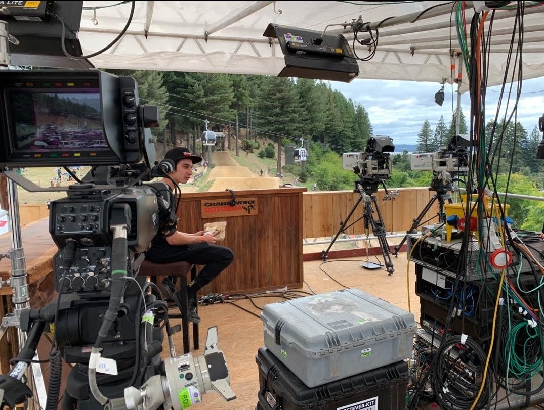 Sam Cowan at the Crankworx Rotorua broadcast compound for Red Bull TV